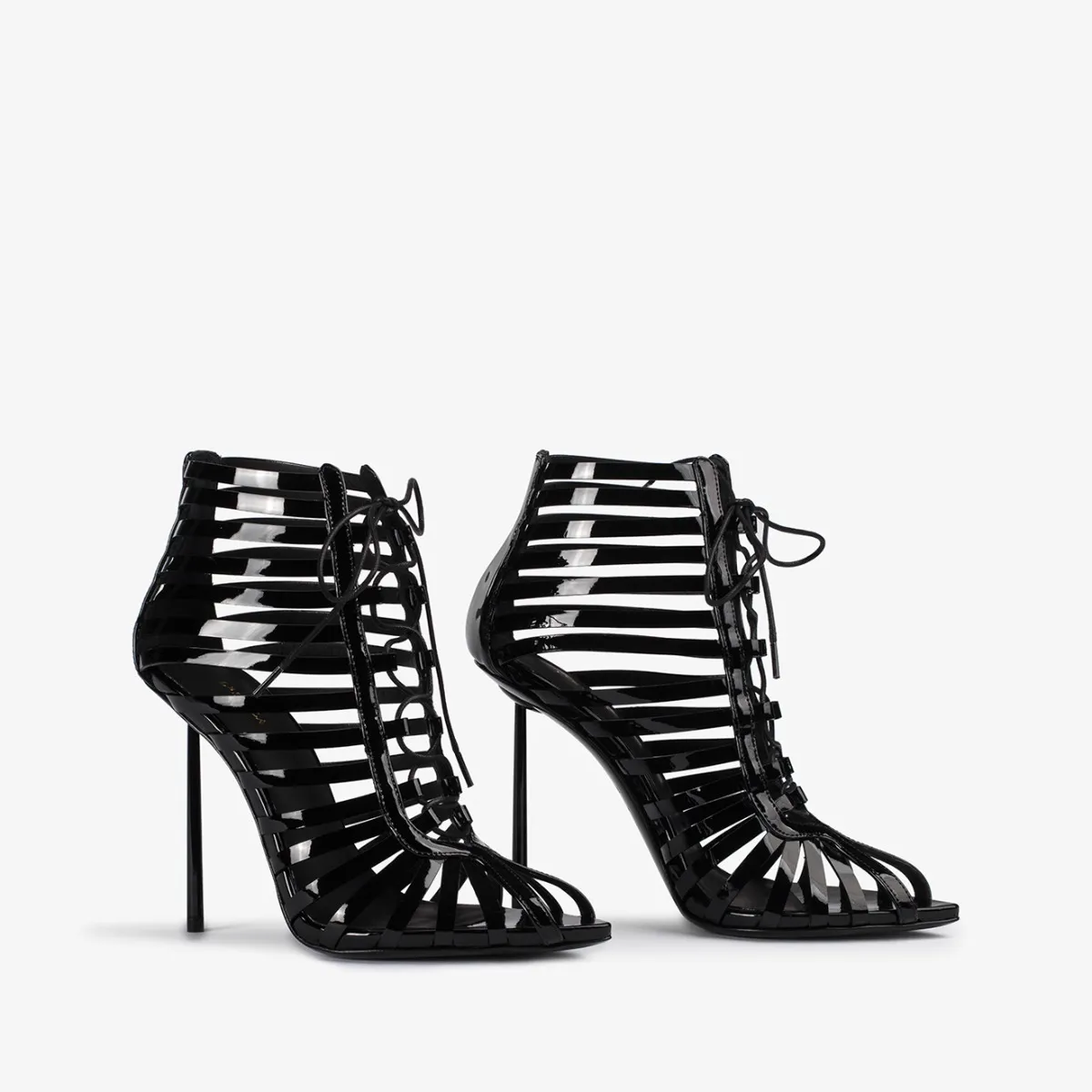 CAGE ANKLE BOOT 120 mm Black patent leather gladiator ankle boot with straps