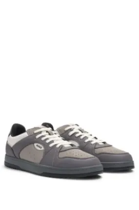 Mixed-material trainers with nubuck-effect trims